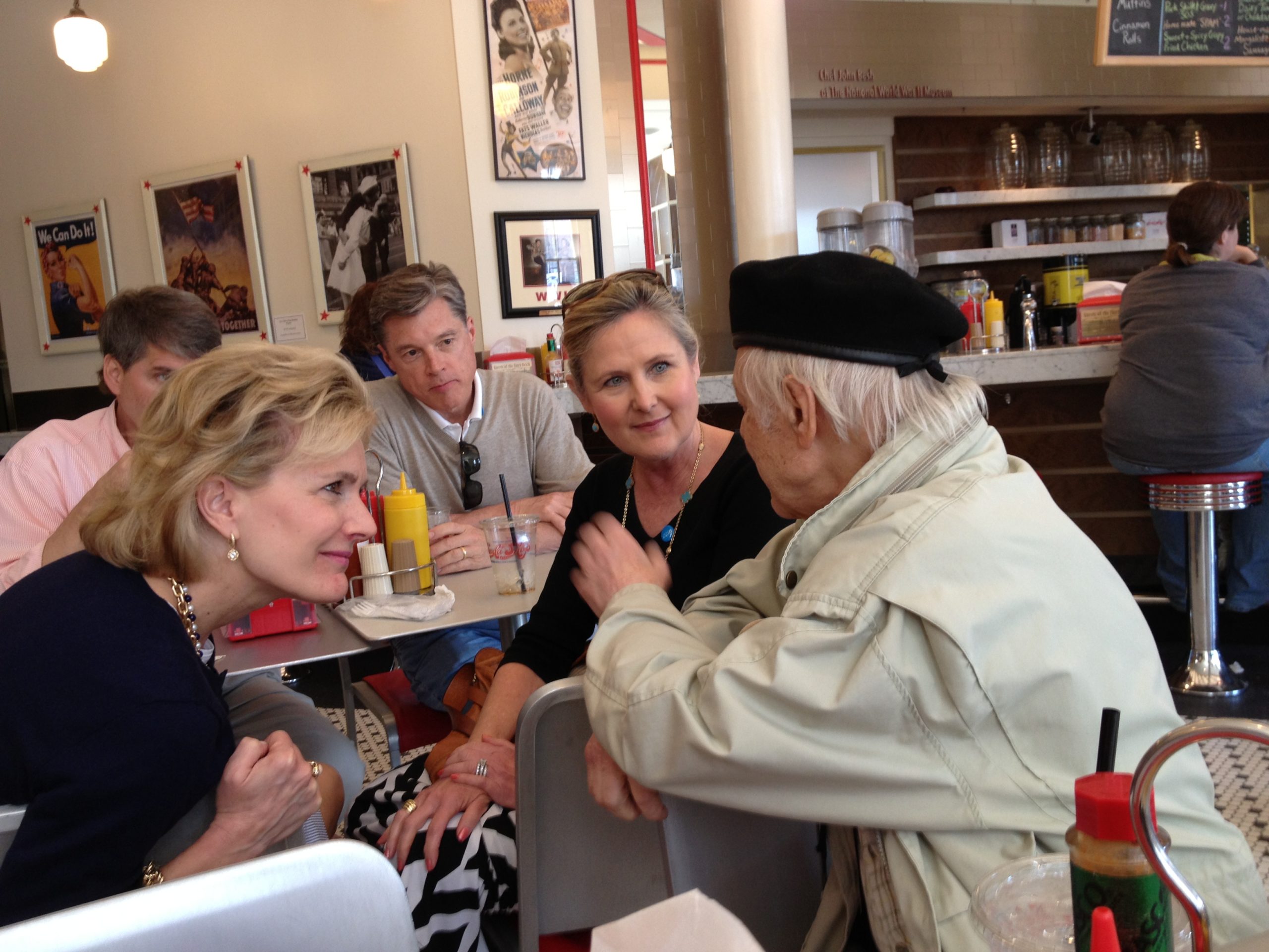 Charley Koenig regales rapt visitors to the World War II Museum cafe with stories of serving as a tanker in Rommel's Africa Corps in 1943
