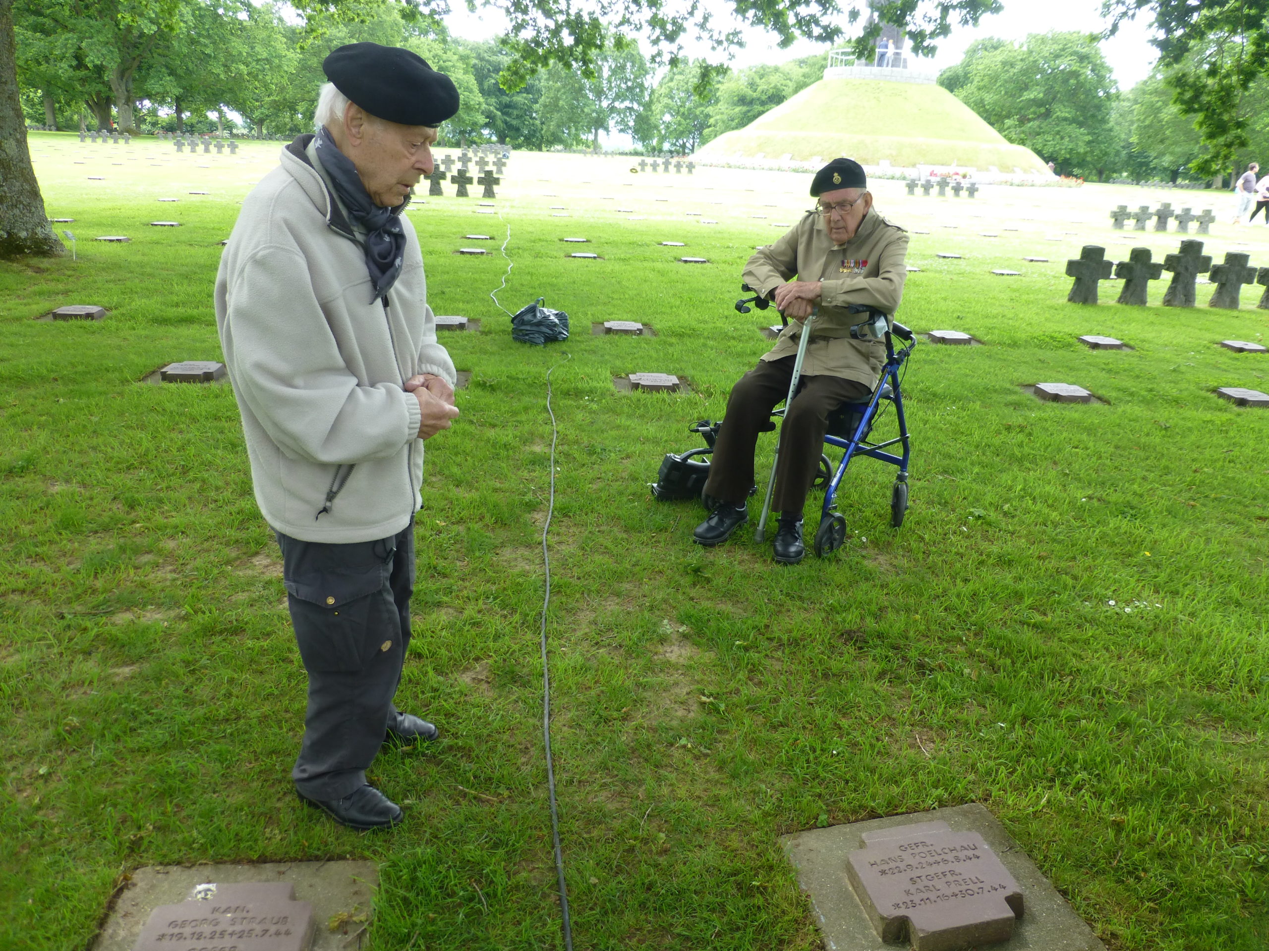 Charley and Graham at the grave of Hans Poelchau, Charley's Jewish childhood neighbor and friend, who died fighting for the Germans in Normandy in 1944