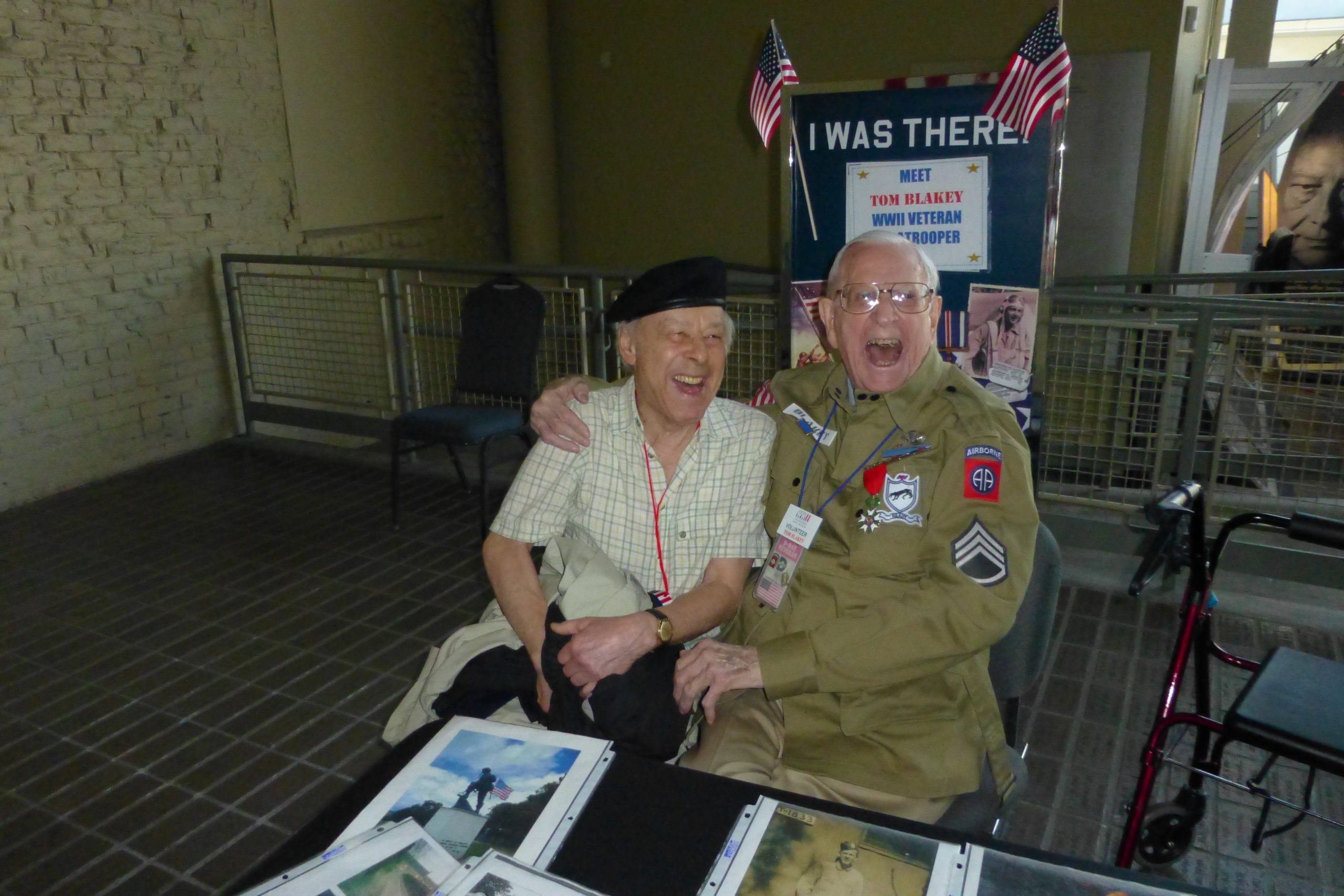 German Panzermann Karl Friedrich Charley Koenig laughing it up with American 82nd Airborne Paratrooper Thomas Blakey