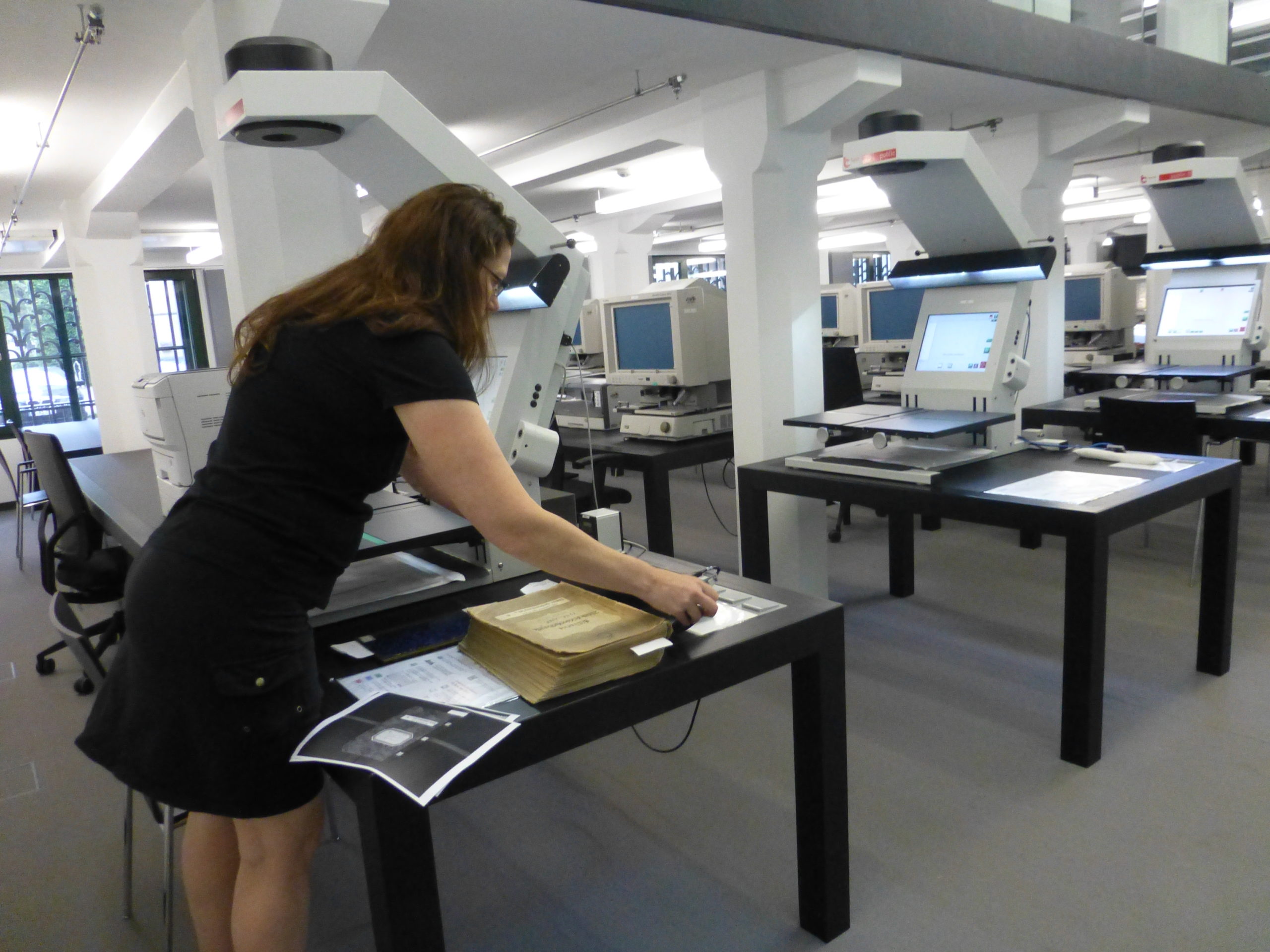 Heather Steele researching St. Heinrichs Medaille records in the Dresden Archive