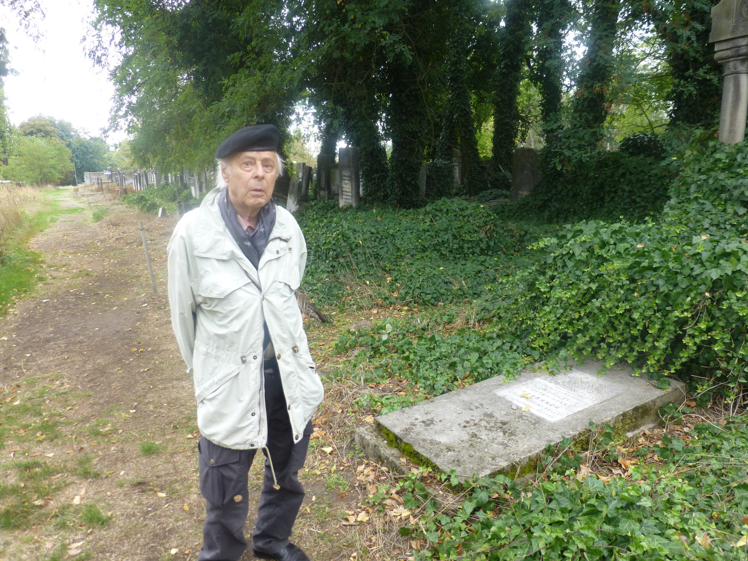 Charley Koenig visits the Jewish Cemetery in Lodz, Poland in 2015
